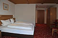 Room with three beds - with shower/WC, cable TV and balcony